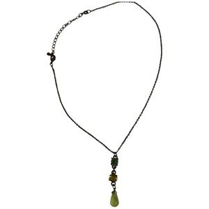 Glass and acrylic both a green color, vintage look necklace